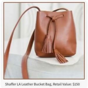 Shaffer LA Leather brown bucket boho crossbody bag w/ tassels.